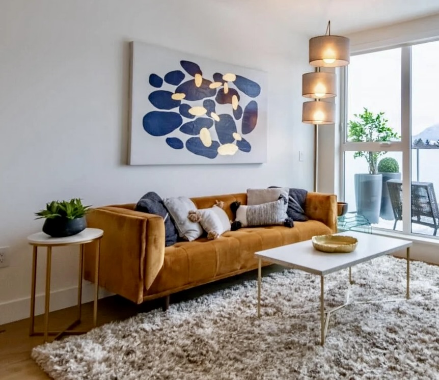 Vancouver condo staging — velvet sofa living room